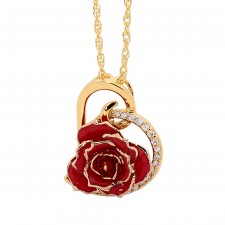 Rot glasierter Rosenblütenanhänger. Herz-Design